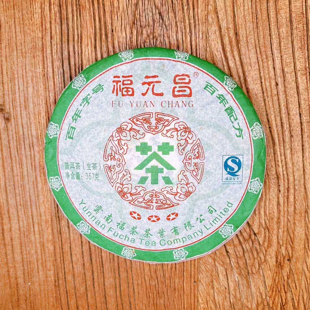 年字号福元昌FU YUAN CHANG百年配普洱(生茶净含量357克茶茶雲南福茶茶葉有限公司质量: 0180Yunnan Fucha Tea Company Limited